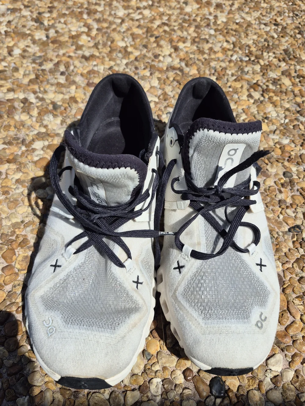 On Running Men’s Cloud Athletic Sneakers in White and Black